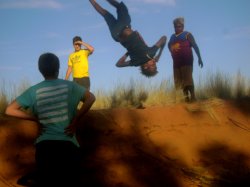 Anangu School Kid Doing Flips