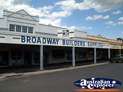 Junee Broadway Builders Supplies Entrance . . . CLICK TO VIEW ALL JUNEE POSTCARDS