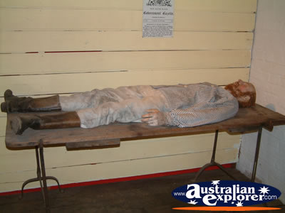 Uralla Museum Fake Person Lying Down . . . CLICK TO VIEW ALL URALLA POSTCARDS