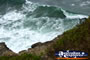Waves breaking on the headland at Cape Byron . . . CLICK TO ENLARGE