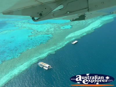 Seaplane over Heart Reef . . . CLICK TO VIEW ALL WHITSUNDAYS (HEART REEF) POSTCARDS