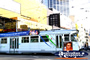 Melbourne Tram on a busy city street