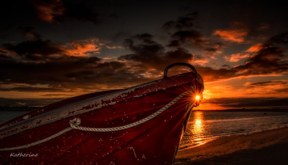 Boat At Sunset