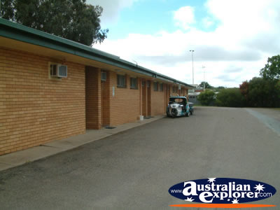 Outside at Junee Motor Inn . . . CLICK TO VIEW ALL JUNEE POSTCARDS