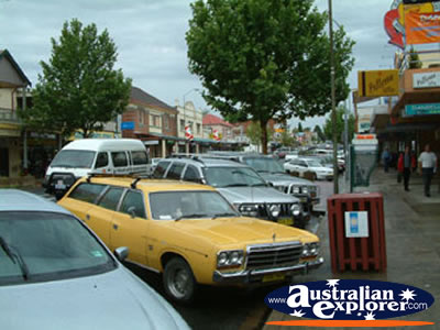 Cars parked on a Cooma Street . . . CLICK TO VIEW ALL COOMA POSTCARDS