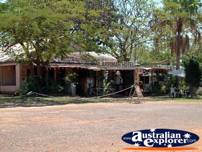 Outside Pink Panther Hotel in Larrimah . . . CLICK TO VIEW ALL LARRIMAH POSTCARDS