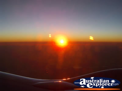 Airplane Mid Flight Sunset . . . CLICK TO VIEW ALL FLYING POSTCARDS