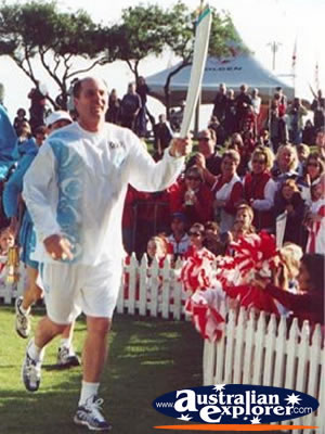 Running with Olympic Flame . . . CLICK TO VIEW ALL OLYMPIC TORCH POSTCARDS