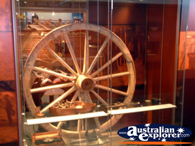 Wheel at Longreach Stockmans Hall of Fame . . . CLICK TO VIEW ALL LONGREACH POSTCARDS