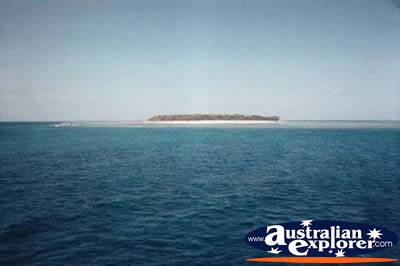 Great Barrier Reef With Island in Distance . . . CLICK TO VIEW ALL GREAT BARRIER REEF POSTCARDS